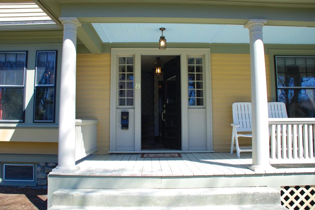 Porch detail in a classic American Foursquare home located in Worcester, Massachusetts. 